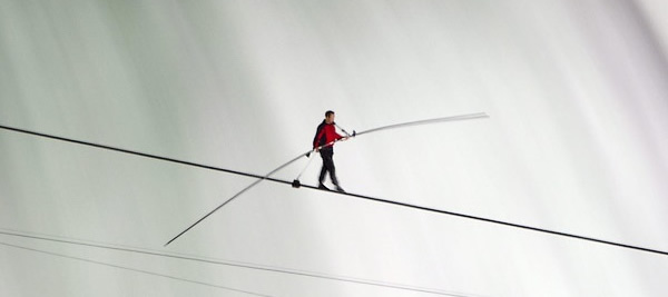 A tightrope walker doesn't look down, he looks forward.