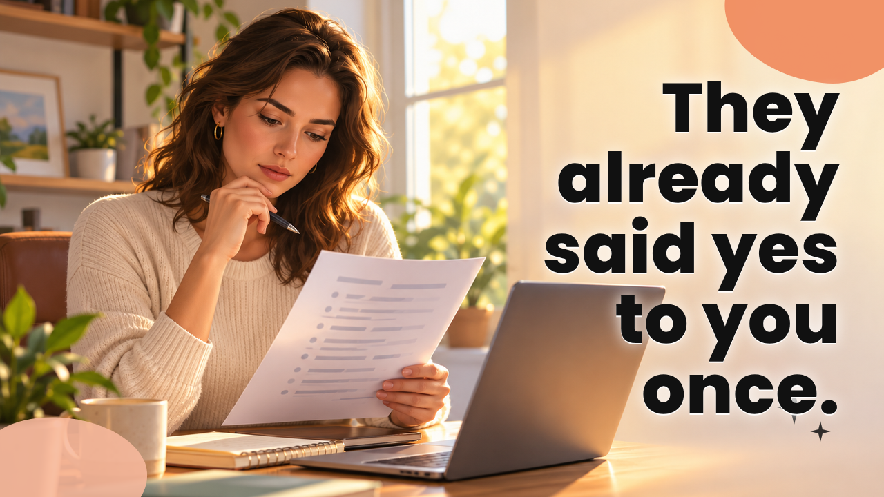 An affiliate manager reviewing a list of former partners at a desk, warm morning light
